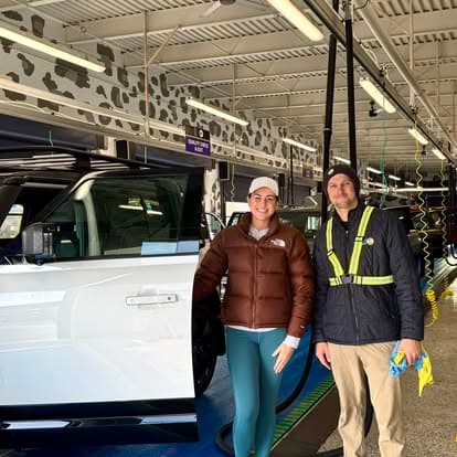 Two Cheetah Clean team members at a location